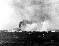 Photo # 80-G-19100:  USS Lexington under attack by Japanese dive bombers, 8 May 1942