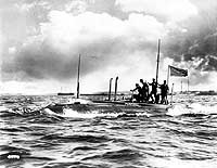 Photo # 80-G-424463:  USS Porpoise underway in harbor, circa 1903-1906