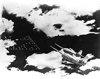 Photo # 80-G-701850:  Diorama by Norman Bel Geddes, depicting U.S. Marine Corps fighters intercepting the Japanese air strike formation heading toward Midway in the morning of 4 June 1942.