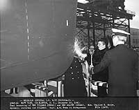 Photo # NH 41791:  Mrs. Charles S. Moore christens USS Tillman, 20 December 1941