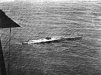 Photo # NH 41896:  USS R-3 surfacing, circa the early 1920s