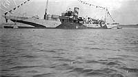 Photo # NH 42427:  USS Piqua dressed with flags, 4 July 1918
