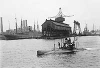 Photo # NH 42620:  USS Plunger underway off the New York Navy Yard, circa 1909