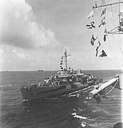 Photo # NH 42812:  USS Paul Hamilton comes alongside USS Makin Island, 11 March 1945