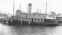Photo # NH 43696:  USS Saco tied up in port during the 1920s