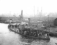 Photo # NH 44266:  USS Jason, ex-Sangamon, at the New York Navy Yard, May 1898