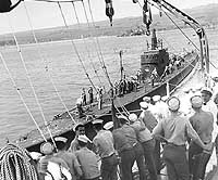 Photo # NH 50389:  USS Trout at Pearl Harbor in early March 1942