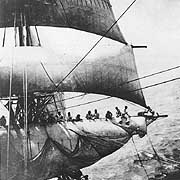 Photo # NH 54220:  Cadets bending on the main sail, on board USS Enterprise, circa 1905.  Photographed by Paul R. Smith