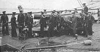 Photo # NH 60342:  Crewmen exercising with USS Trenton's forward pivot gun, 1886