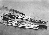 Photo # NH 61683:  USS Argonne with submarines alongside at Panama, 1927-28