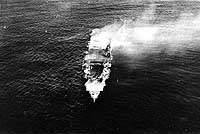 Photo # NH 73065:  Japanese aircraft carrier Hiryu afire, shortly after sunrise on 5 June 1942.  She sank a few hours later.