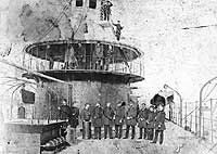 Photo # NH 85301:  Junior officers on board USS Miantonomoh, circa 1869-70