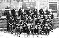 Photo # NH 92570:  GMC Frank W. Crilley with members of the Navy Diving School Class of June 1917