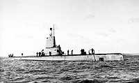 Photo # NH 95925:  USS Cochino leaving Portsmouth, England, circa July 1949.