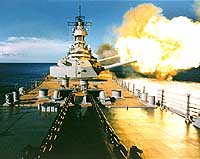 Photo # NH 97207-KN:  USS Wisconsin (BB-64) fires a broadside with her 16-inch and 5-inch guns, circa 1988-91