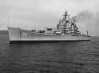 Photo # NH 98459:  USS Columbus off the Puget Sound Navy Yard, 14 March 1959