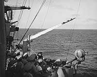 Photo # NH 98846:  USS Galveston launches a Talos guided missile, 24 February 1959