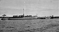 Photo #  NH 99503:  Motor boat Killarney alongside a Great Lakes dock, prior to World War I