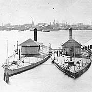 Photo # NH 100992:  USS Shawnee and USS Wassuc laid up at the Boston Navy Yard, circa 1871-1872.