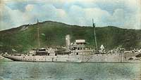 Photo # NH 102839-KN:  Color-tinted photograph of USS Lydonia in a Caribbean port, 1919