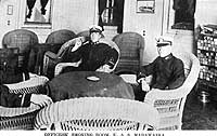 Photo # NH 103149:  Scene in the officers' smoking room on USS Madawaska