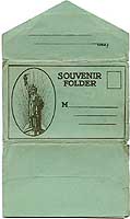Photo # NH 103289-KN: Cover of a 'Souvenir Folder' featuring photographs of and on board USS Henry R. Mallory