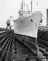 Photo # NH 103568:  USNS General Simon B. Buckner in drydock at Bremerhaven, Germany.