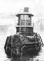 Photo # NH 104067:  Harbor tug Elliott, possibly photographed in the vicinity of New York City on 31 May 1918.