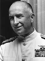 Photo # NH 104903:  Admiral Thomas H. Moorer at a reception at the U.S. Naval Station, Sangley Point, Republic of the Philippines, circa early July 1967.  Photographed by PHC William M. Powers.