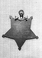 Photo # NH 105358:  Medal of Honor awarded to Landsman Gurdon H. Barter, USN