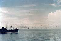 Photo # 80-G-K-385:  USS President Jackson maneuvering during Japanese air attack, 8 August 1942
