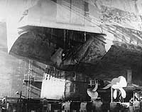Photo # 19-N-105833:  Partially patched torpedo damage to USS Houston's stern, 1944