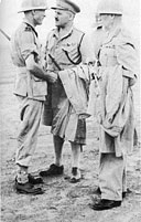 (I.</i> to r.): Brigadier D. H. Pienaar, Major-General A. R. Godwin-Austen and General Smuts during one of the South African Commander-in-Chief's visits to South African troops in East Africa.