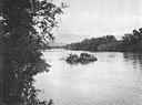 The Omo River ferry between Soddu and Jimma, with the demolished bridge in the background.