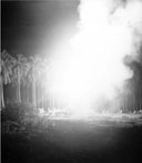 90-MM. ANTIAIRCRAFT GUN IN ACTION against enemy aircraft over Rendova