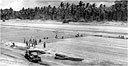 members of a construction battalion laying pierced planking across a runway in the Cape Torokina area