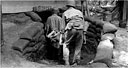 LITTER PATIENT being carried by medical aid men into an underground surgery room