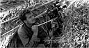 PHOTOGRAPHER FILMING ACTIVITY ON ARAWE, using a 35-mm. Eyemo movie camera