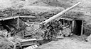 DUAL-PURPOSE GUN near the beach, left by the Japanese when they departed in haste