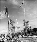 UNITED STATES COLORS FLYING OVER BETIO, 24 November 1943