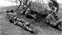 OBSERVERS USING AN OBSERVATION TELESCOPE M49 watch for signs of the enemy from the high ground