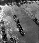 LCI'S UNLOADING ASSAULT FORCES offshore at Morotai