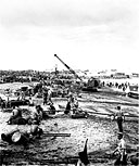 SUPPLIES ON THE BEACH ON LINGAYEN GULF