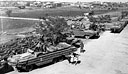 Two-and-a-half-ton amphibian trucks unload supplies at Dagupan