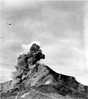 BOMB STRIKE ON A MOUNTAIN west of Bamban