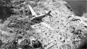 C-47 dropping supplies to the troops which have landed