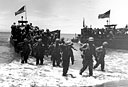 SUPPLIES, EQUIPMENT, AND TROOPS coming ashore at Legaspi