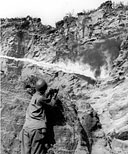 FLAME THROWERS burning out enemy troops in a hidden cave
