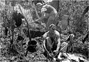 drying clothes and digging a new foxhole