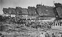 GIANT SEAGOING 'FREIGHT CARS' UNLOAD WAR CARGOES ON LEYTE